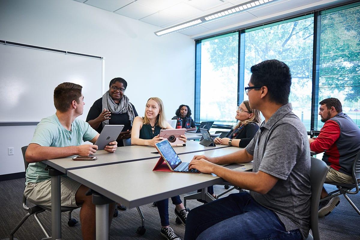 Accounting degree program students collaborating on a project