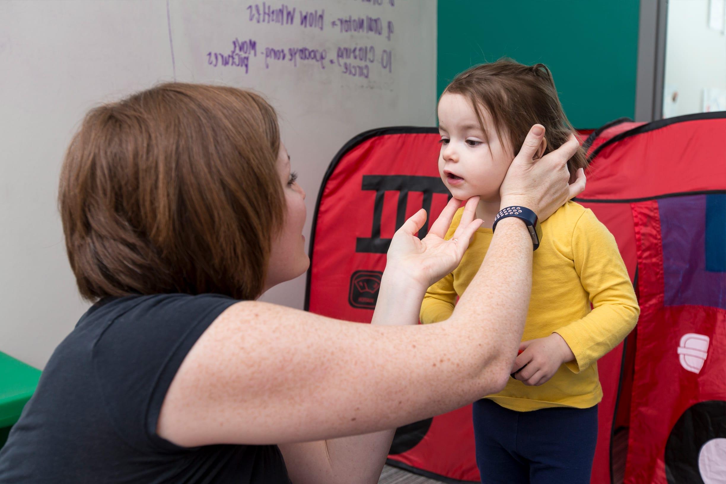 Speech Language pathology student working with Child