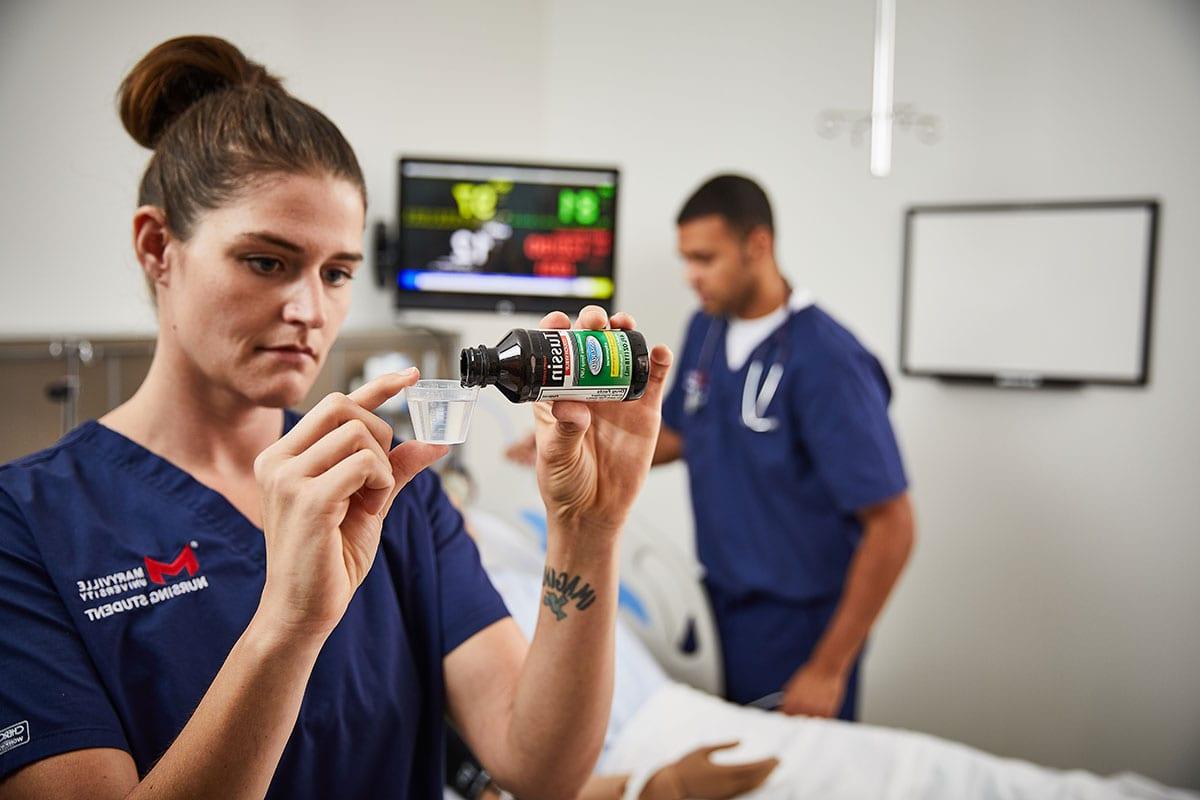 healthcare management students in nursing lab